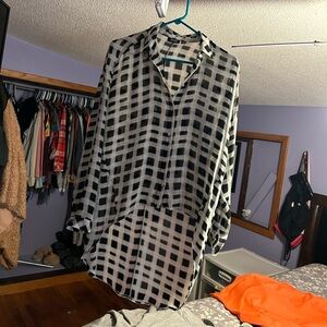 Women’s black and white checkard blouse